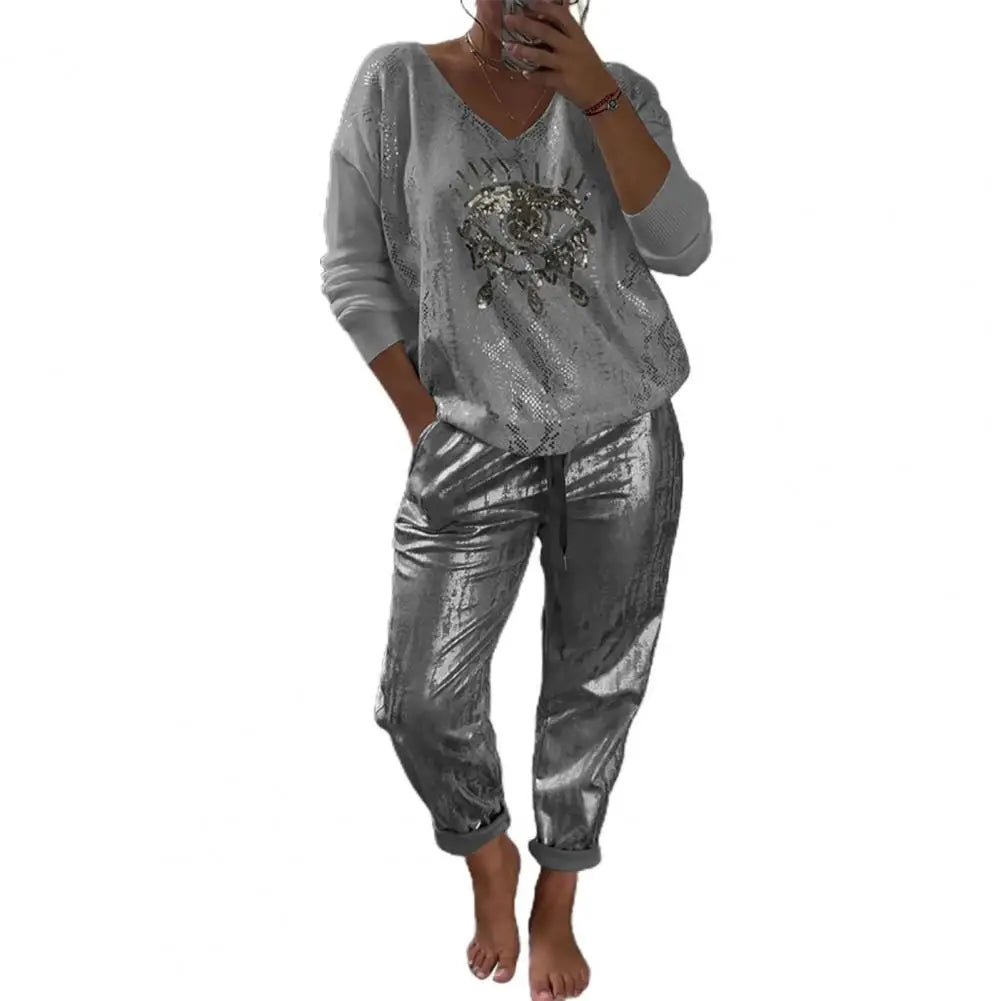 Elena – Weites Hosen-Set für Damen mit Eye-Print und V-Ausschnitt