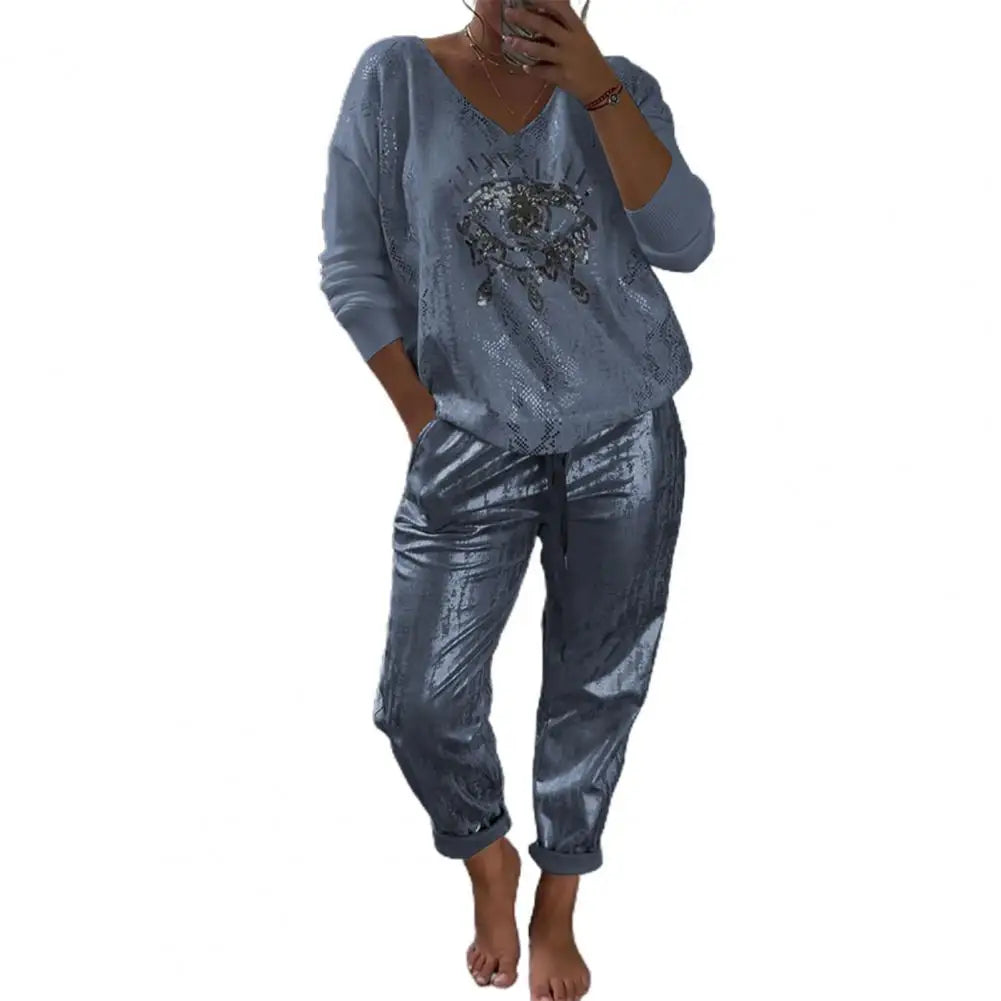 Elena – Weites Hosen-Set für Damen mit Eye-Print und V-Ausschnitt