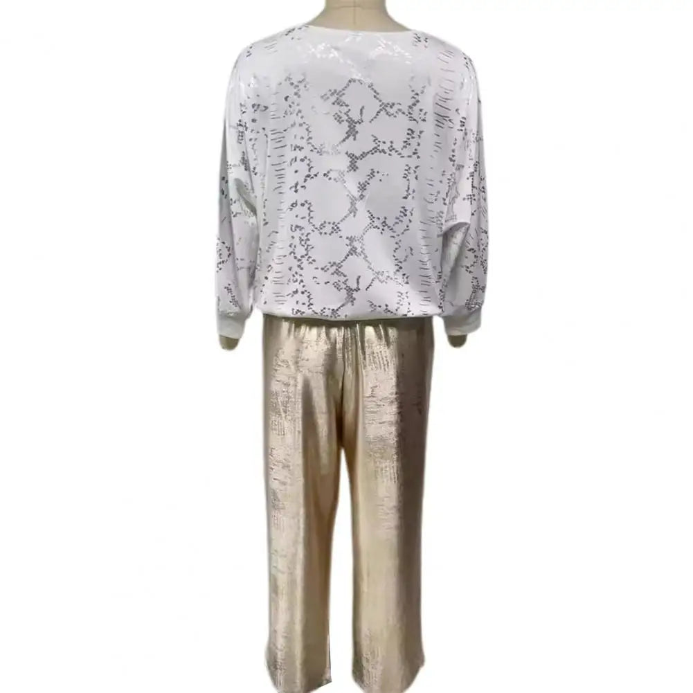 Elena – Weites Hosen-Set für Damen mit Eye-Print und V-Ausschnitt