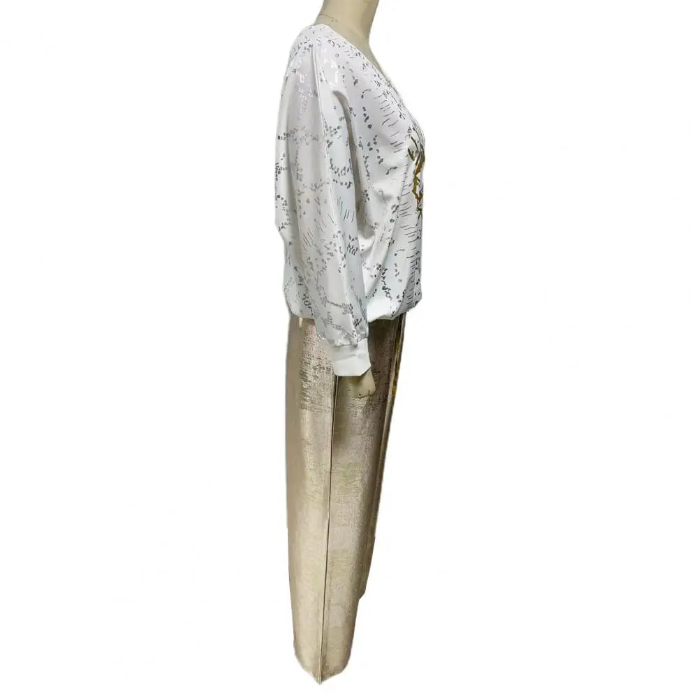 Elena – Weites Hosen-Set für Damen mit Eye-Print und V-Ausschnitt