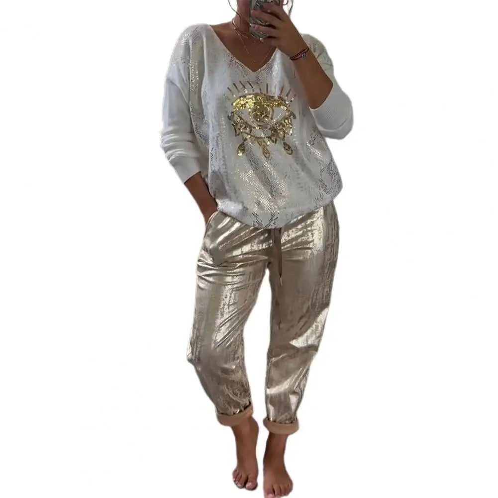 Elena – Weites Hosen-Set für Damen mit Eye-Print und V-Ausschnitt