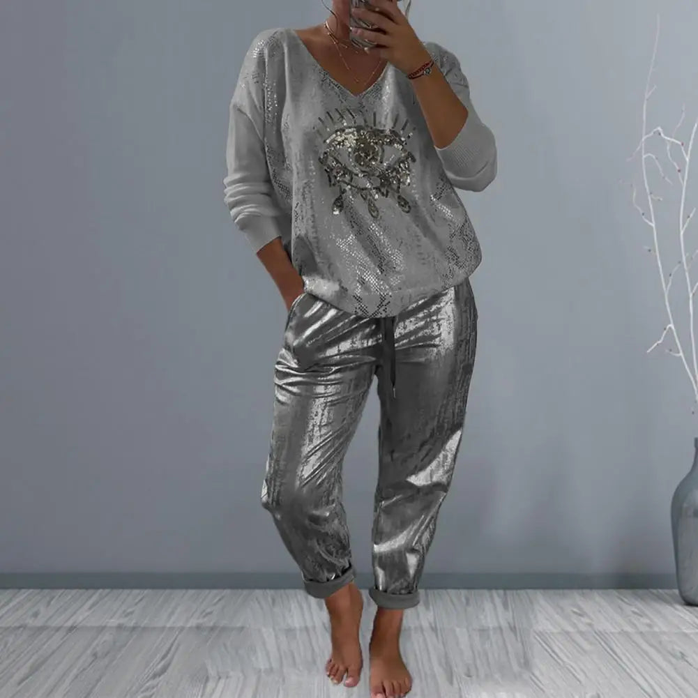 Elena – Weites Hosen-Set für Damen mit Eye-Print und V-Ausschnitt